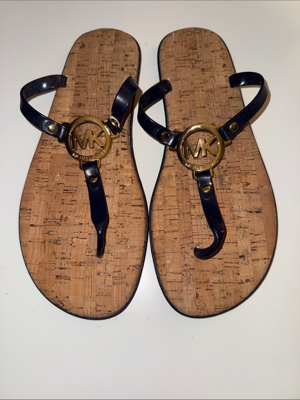 Michael Kors Black Thong Sandals with Gold MK Emblems